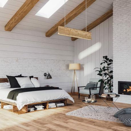 Dormitorio escandinavo en una casa de campo de lujo