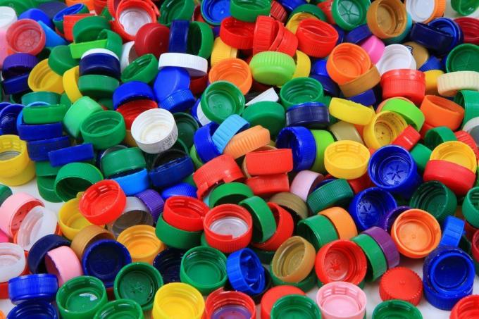 plastikinių gyvūnų kepurių tekstūra kaip gražus spalvotas fonas